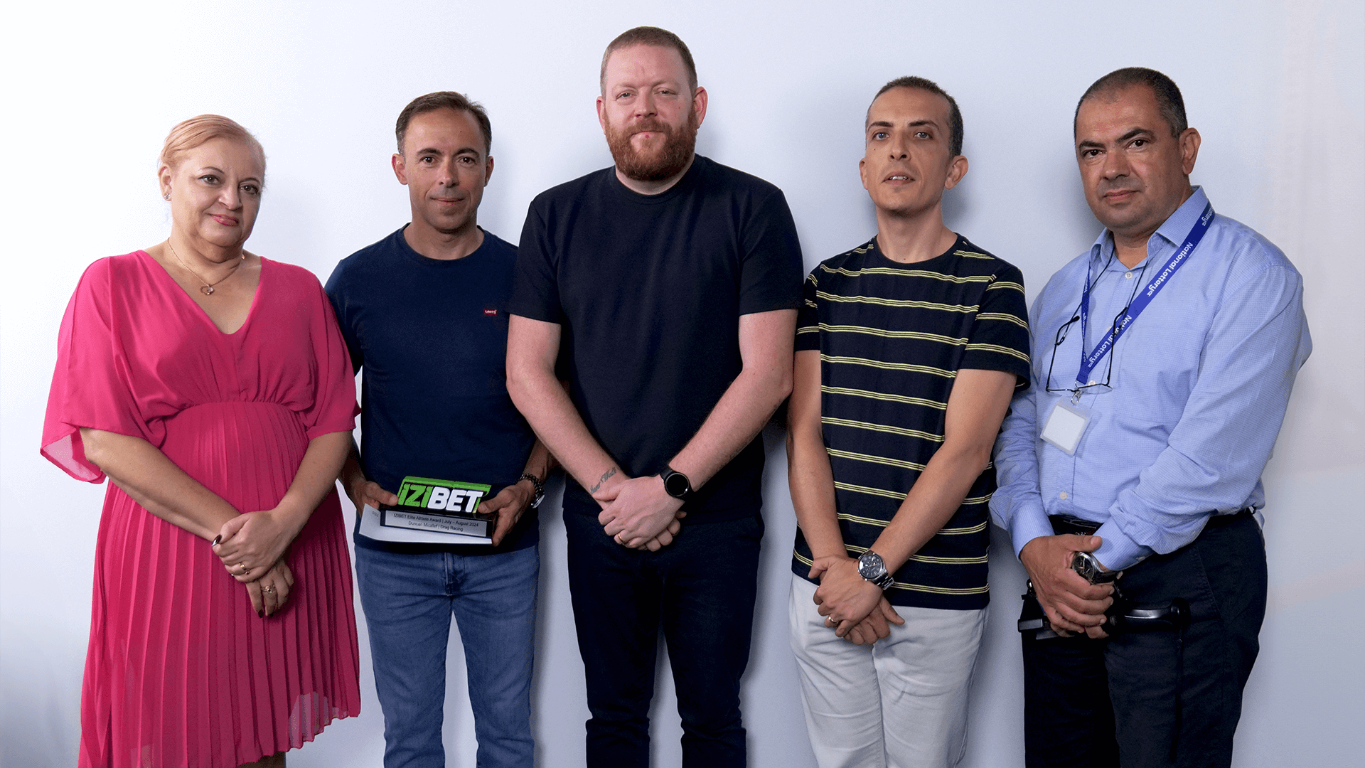 (From left) Lorraine Cunningham (General Secretary of the Malta Sports Journalists Association), Duncan Micallef, James Morgan (Brand Manager of IZI Group plc), Stephen Azzopardi (Administrator of the Malta Sports Journalists Association) and Oliver Attard (Vice General Secretary of the Malta Motorsport Federation).