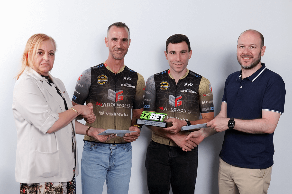 (From left) Lorraine Cunningham (General Secretary of the Malta Sports Journalists Association) Stephen Grima and Brandon Sultana (Team Gaudos) and Clinton Buhagiar (President of the Malta Sports Journalists Association).